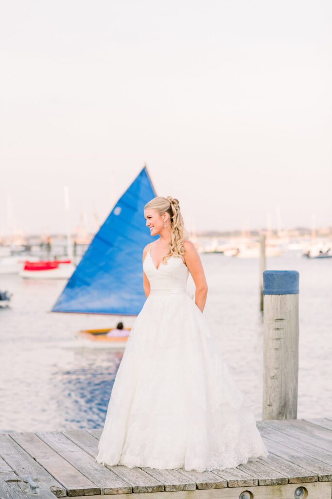bride standing on boat dock at White Elephant Nantucket