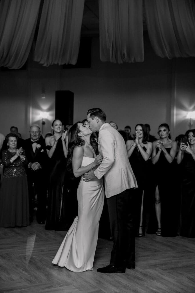 Bride and groom sharing their first dance during elegant Renault Winery wedding reception in New Jersey
